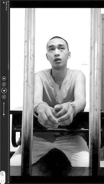 在看守所里的陳明燦。視頻截圖