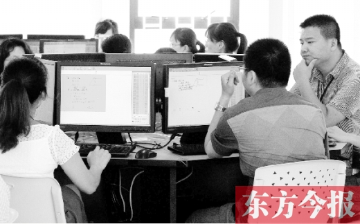 東方今報(bào)記者打探中招評卷現(xiàn)場 零分試卷全都復(fù)檢