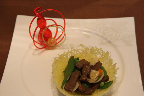 雀巢爆羊柳。 花惠生 供圖